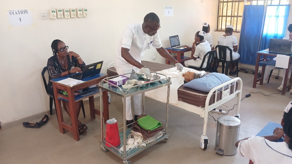 Student practising a clinical procedure in the skills laboratory