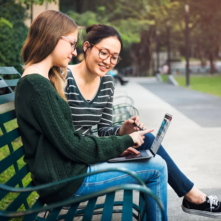 Nursing students collaborating outdoors