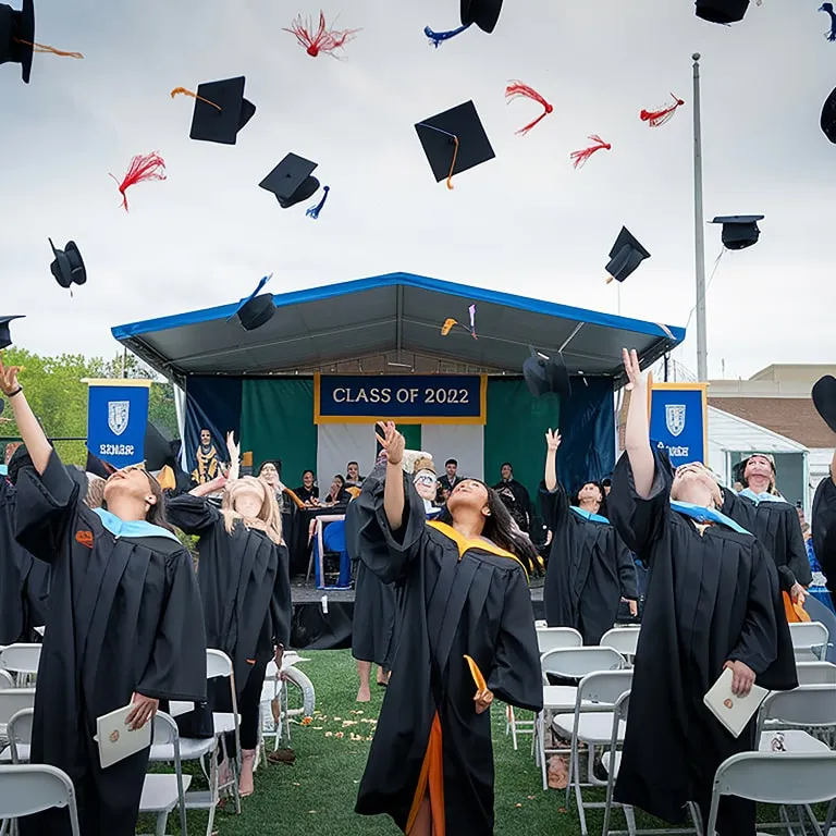 Graduates celebrating at commencement
